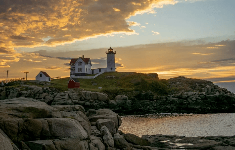 Image of lighthouse and sunrise over the ocean. Freshwater and saltwater fishing license is available.
