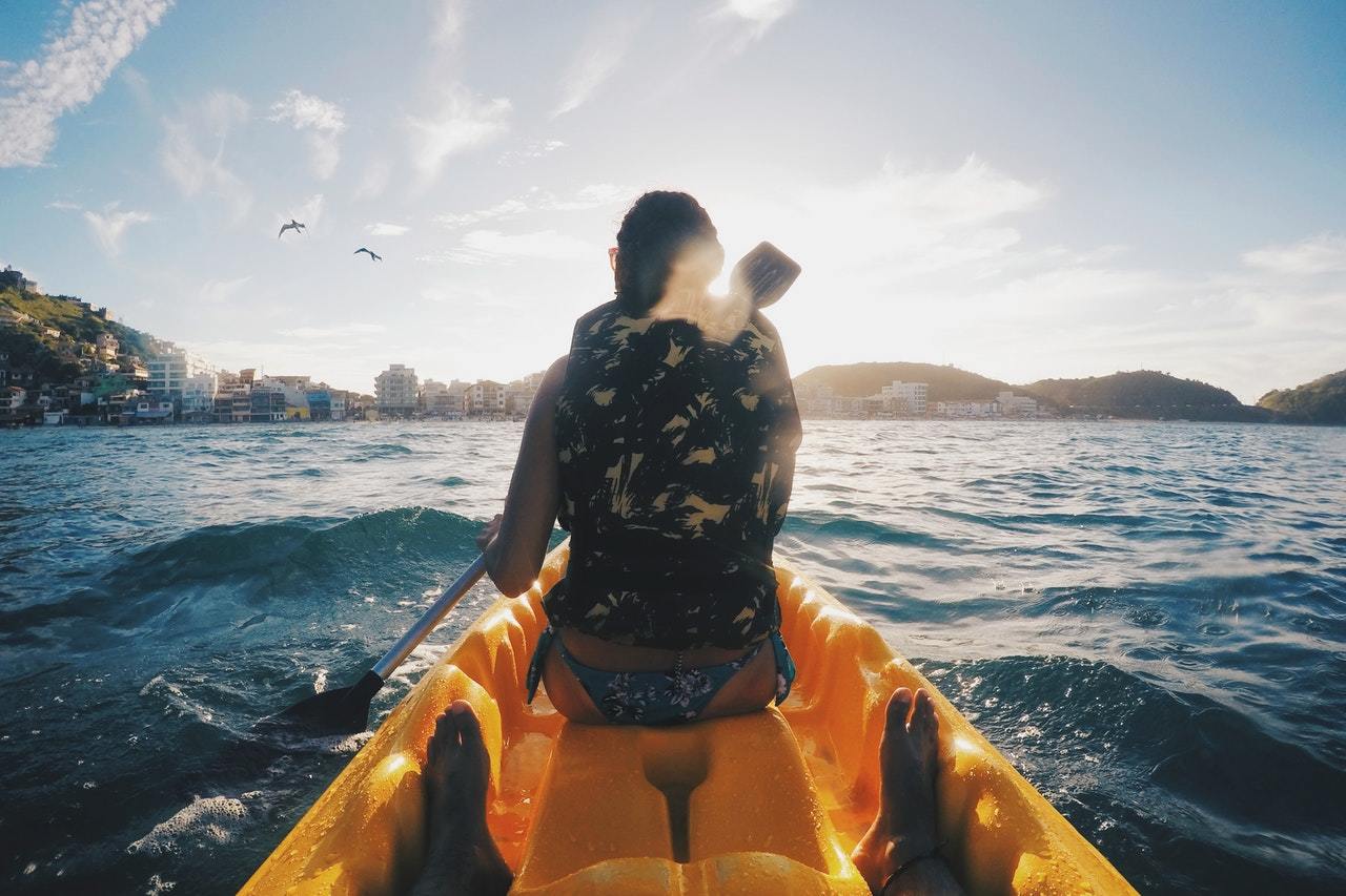woman wearing vest on a boat