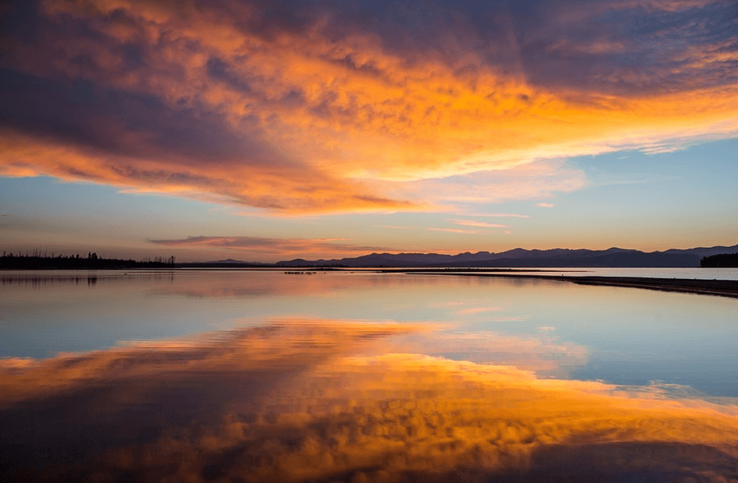 Sunset over Montana lake, where a fishing license is required
