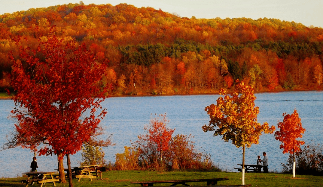Lake in Pennsylvania showing man with fishing license and two boys